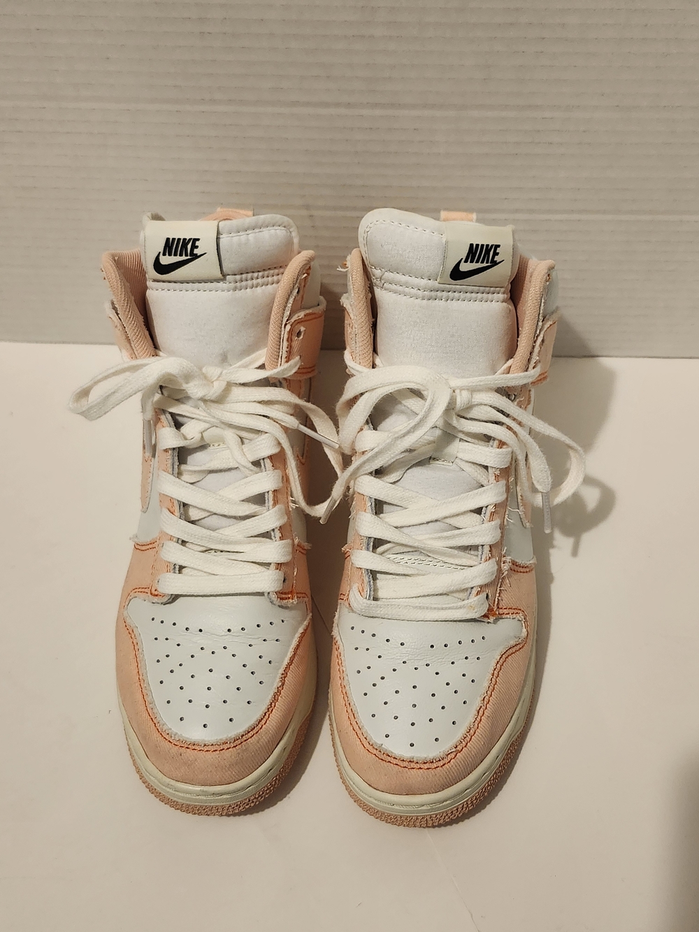 Nike Women’s High-Top Sneakers in White and Peach